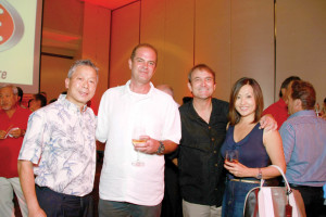 (From left) George Lai, president, Quality Distributors; James S. Herbert III, general manager, Triple J Five Star Wholesale Foods Inc.; W. Ray Gibson, director of radio operations, Sorensen Media Group; and Mika C. Gibson, manager, Archway Inc., and wife of Ray. Photo by Michael Cepeda