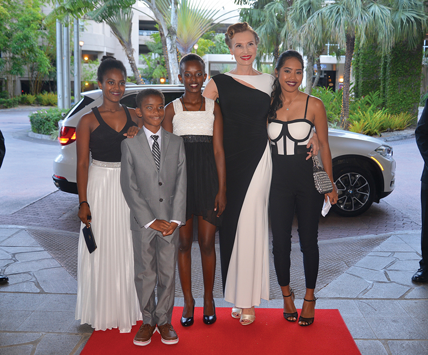 Dr. Jitka Lom, president and medical director, ExpressCare Health & Skin Center Inc., and Businesswoman of the Year nominee, arrives at the gala with (from left) Saron Rahmani, 15; Ashenafi Lom, 8; Ruth Rahmani, 13, all children of Dr. Jitka Lom; and Keila Sato.
