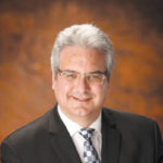 John W. Wade CEO, American territories ANZ Guam Inc